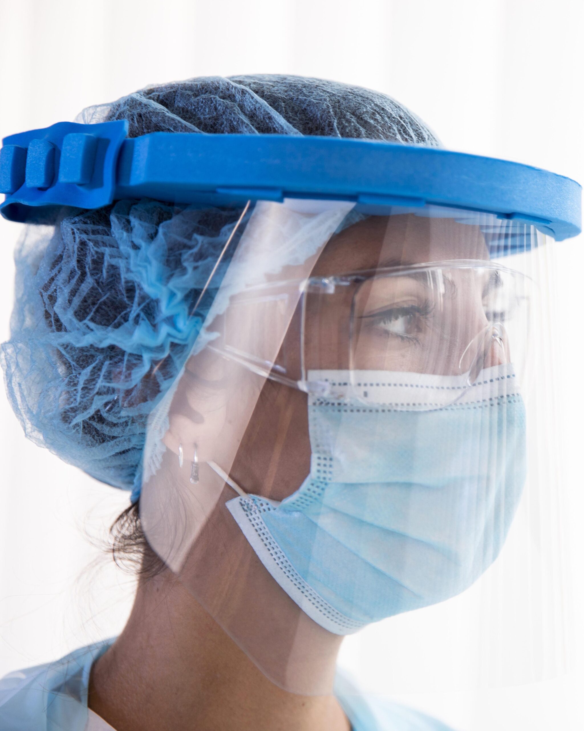 portrait-female-doctor-protection-wear-close-up