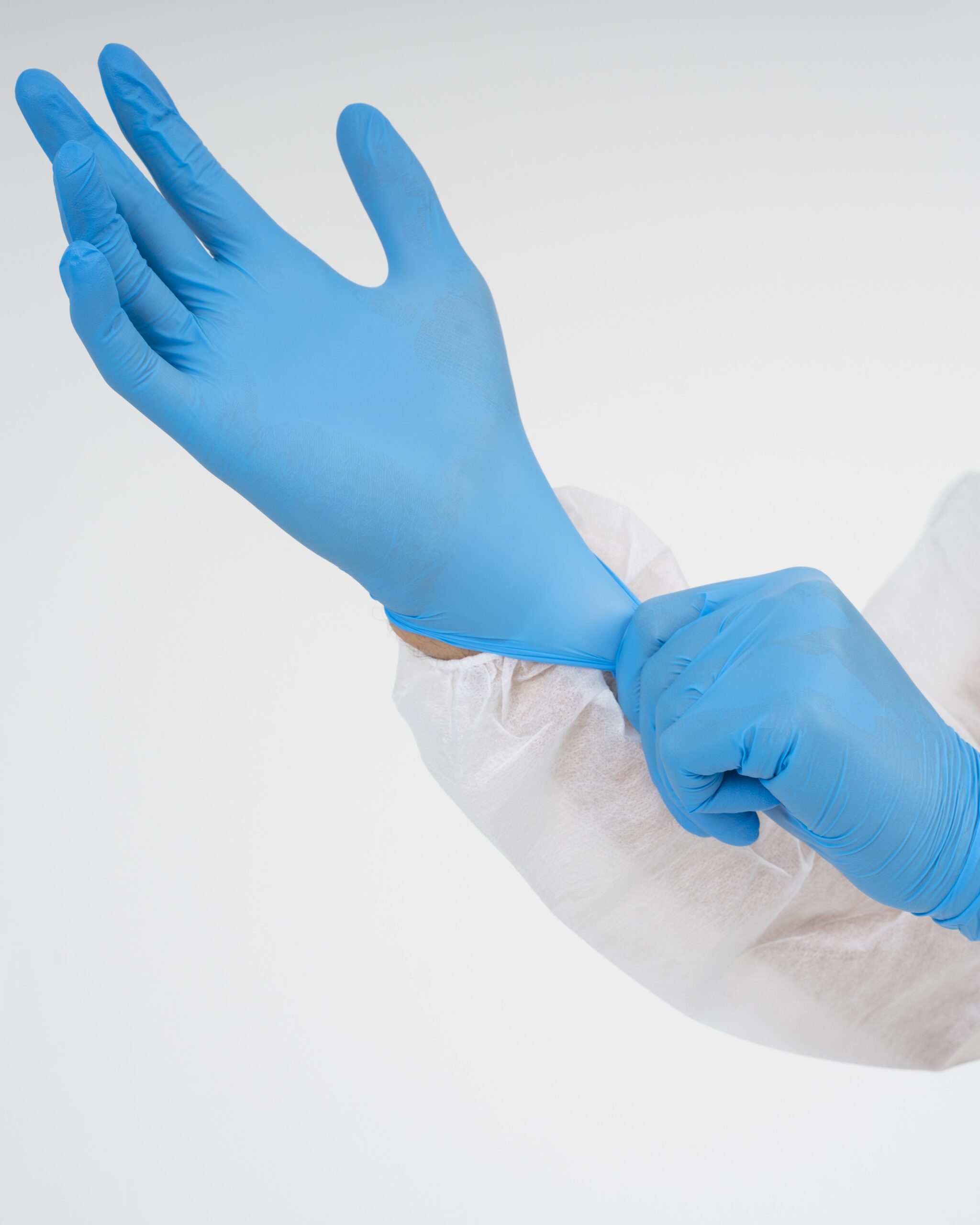 side-view-doctor-putting-glove